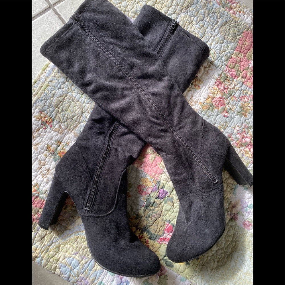 Tall black suede-like boots
